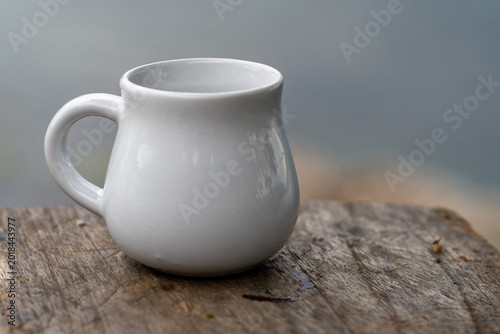 White Ceramic Mug on Rustic Wooden Table Minimal Cozy Coffee Cup Close Up