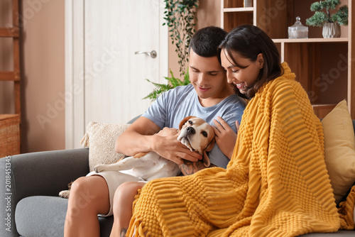 Young couple with cute Beag...