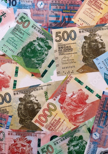 Canvas Print Hong Kong dollar money bills pile on table