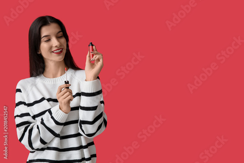 Beautiful young woman with ...