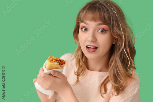 Surprised young woman with ...