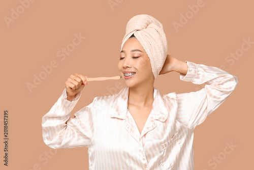 Young Asian woman with toot...