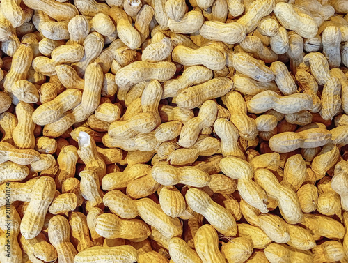 Peanuts in shells on a background