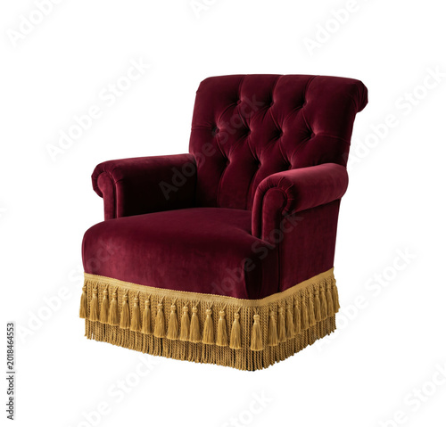 Obraz na plátně Burgundy velvet tufted armchair with gold tassels isolated