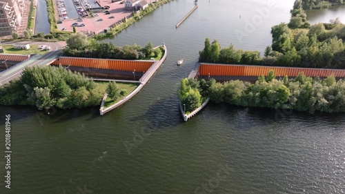 Veluwemeer Aqueduct, road crosses under a waterway in the Netherlands. Innovative intersection of highway and Water Bridge.