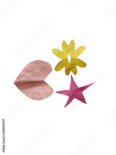 Colorful paper shapes with starfish and flower on pastel background