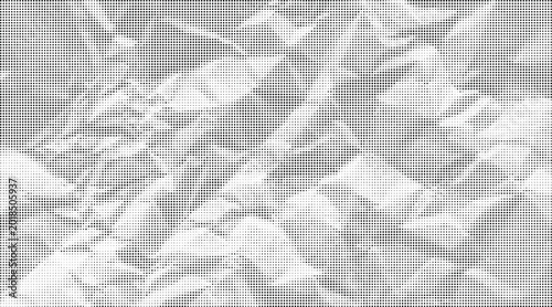 Foto The crumpled sheet of white paper lies on a surface with many folds and creases