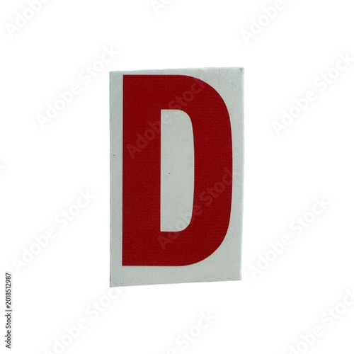 Obraz na plátne Ransom note style alphabet letter D hand-cut from vintage newspapers and magazines