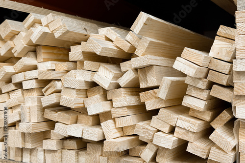 Pile of cut lumber stacked for storage