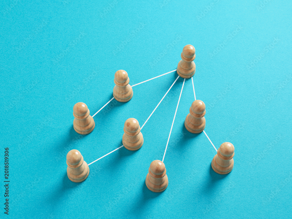 Obraz premium Chess pawns illustrating hierarchical business organization, leadership, and network