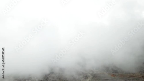 Aerial View of Thick Clouds Flowing Over the Papuan Highlands