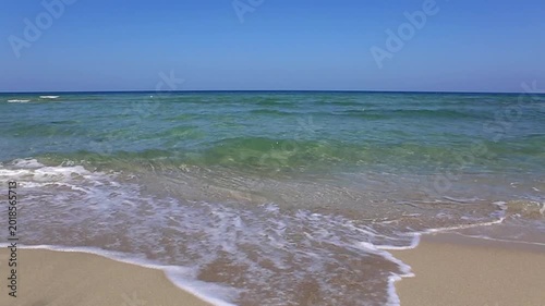 Travel summer background with blue sky and turquoise water .
