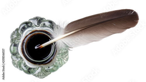 Fotografie Antique Green Glass Inkwell with Dark Ink and Brown Feather Quill