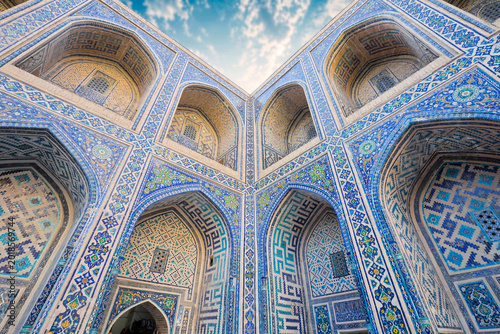 UZBEKISTAN - SAMARKAND - ULUGH BEG MADRASA, THE OLDEST OF THE THREE REGISTAN MADRASAS, WITH ISLAMIC ARCHITECTURE, MOSAIC TILES AND ARABIC CALLIGRAPHY IN HISTORIC UZBEKISTAN