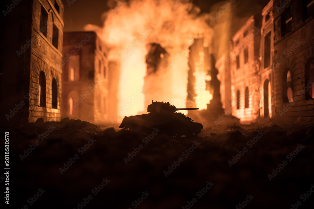 Fototapeta premium War Concept. Military silhouettes fighting scene on war fog sky background, World War Soldiers Silhouette Below Cloudy Skyline At night. Battle in ruined city.