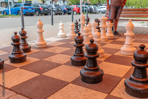 Canvas Print Large outdoor chess set in a public urban space