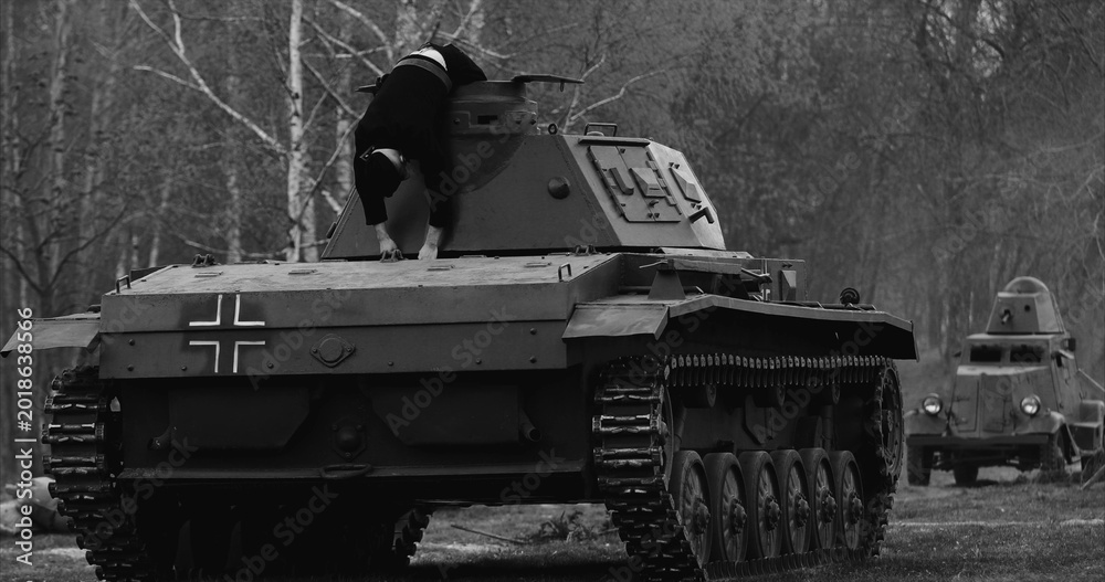 Fototapeta premium Historical Re-enactment Black And White Video. After Battle. Re-enactor