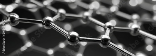 Close-up of a molecular structure with metallic spheres and connecting rods, representing scientific concepts.