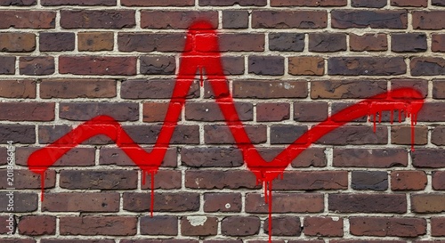 Red graph on brick wall