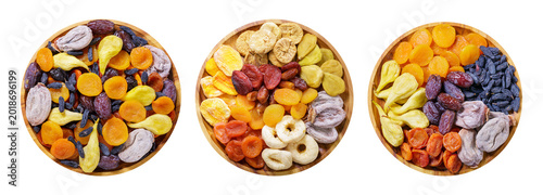 Set of various plates of dries fruits isolated on transparent background, top view