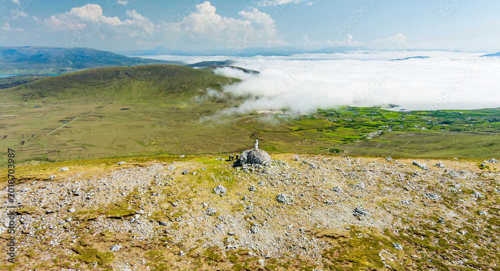 Obraz premium Statue of the Virgin Mary on Minaun Heights, Achill Island, County Mayo, Ireland. Rocky mountain summit with sweeping Atlantic views on the Wild Atlantic Way.