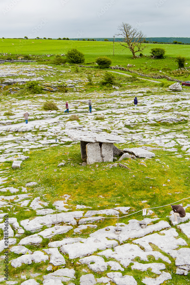 Fototapeta premium Aerial view of Poulnabrone Dolmen in the Burren karst landscape, County Clare, Ireland. Neolithic portal tomb on the Wild Atlantic Way.