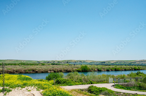 The scenic views of Karkamış Bridge (Turkish: Karkamış Köprüsü) is a Parker-truss bridge carrying the Baghdad Railway across the Euphrates in southeastern Turkey. It is on the frontier between Turkey 