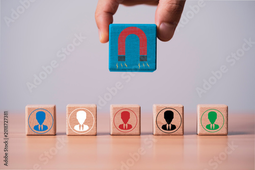 Customer retention strategy concept with magnet attracting user icons represent loyalty, client engagement, relationship management, repeat business, brand trust and long term customer value.