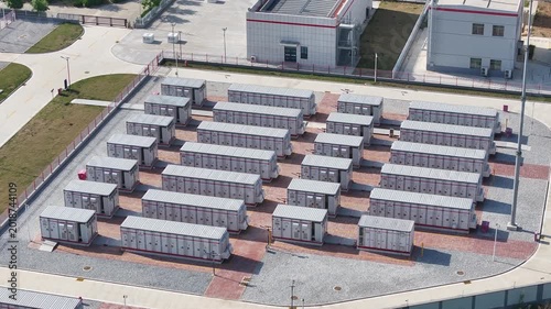 Aerial view of large-scale energy storage container arrays in an industrial facility