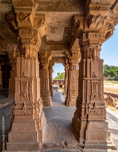 Ornate stone column arcade path