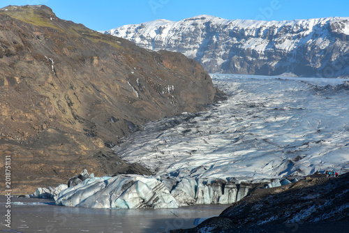 Photography Scenic view of calving Sólheimajökull outlet glacier in southern Iceland