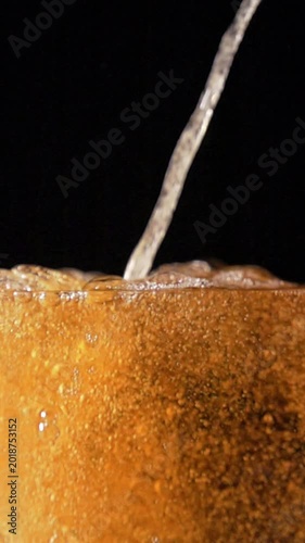 Craft Beer Pouring Into a Glass From a Bottle Captured in Super Slow Motion at 1000 Fps for a Detailed Look at the Action