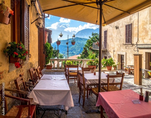 Outdoor cafe with mountain view (1)