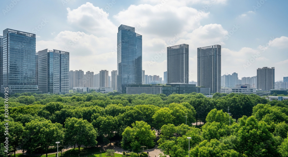 Fototapeta premium Modern City Skyline with Contemporary Skyscrapers Rising Above a Lush Green Urban Park on a Bright Sunny Day
