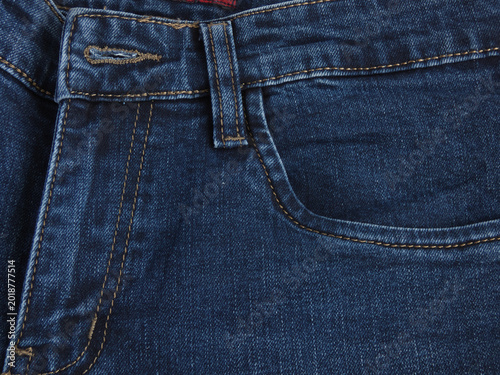 Billede på lærred Front Pocket and Waistband of Dark Blue Denim Jeans with Bar Tack Stitch
