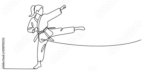Foto Continuous one line drawing of a woman doing a karate kick martial arts