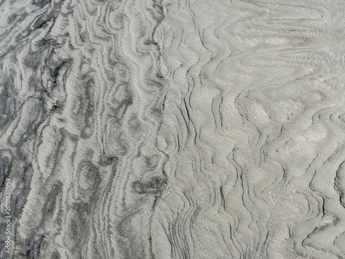 Foto Wavy sand ripple texture background with natural lines