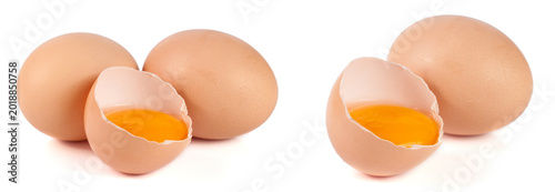 two whole eggs and broken egg isolated on white background
