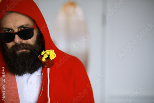 Obraz na płótnie Handsome man or lumberjack, bearded hipster, with beard and mustache in shirt wi