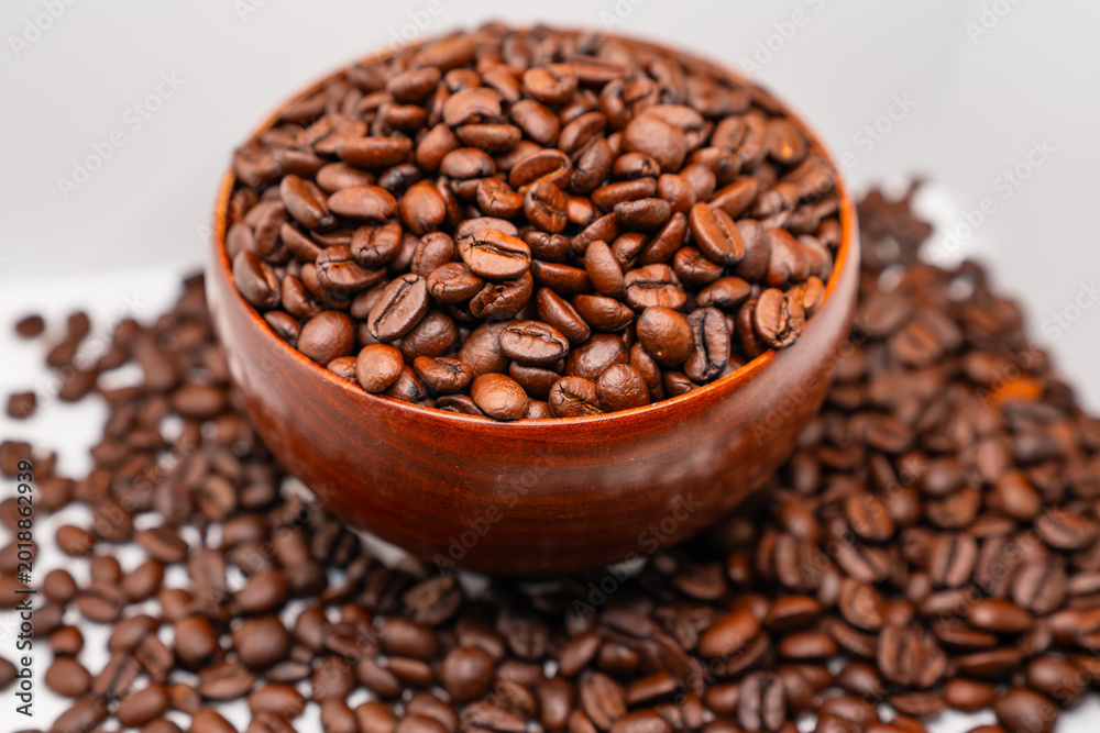 Fototapeta premium coffee beans in a cup