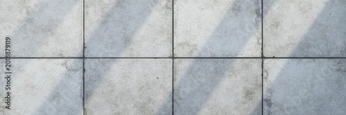 An overhead view of grey square terrace tiles with a concrete effect and non-slip surface, perfect for home decor and texture background , non-slip, home