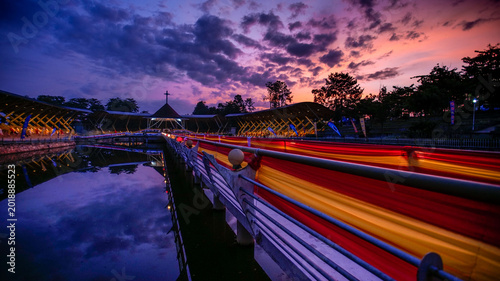 Catholic church at sunrise amidst beautiful clouds in Uganda, Africa.