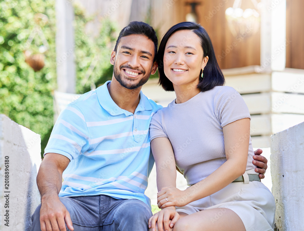 Fototapeta premium Happy, asian couple and portrait with partner in garden for love, outdoor romance or date together. Man, woman or smile with hug or embrace for comfort, holiday or weekend in backyard, house or home