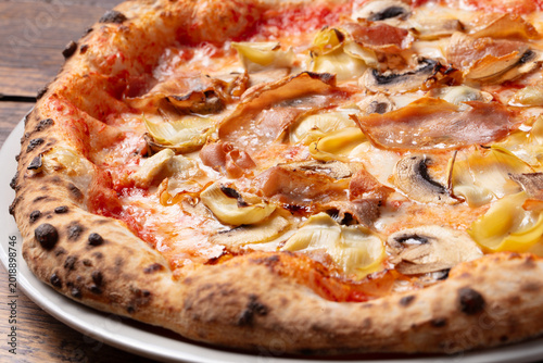 Εκτύπωση καμβά Close up of artisan supreme pizza with mushrooms, olives, italian sausage and me