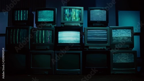 Vintage Screens With Static Noise. CRT Displays Emit Flickering Signals Amid Colorful Interference