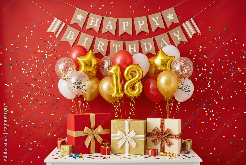 Fototapeta premium Festive birthday scene, red background, balloons, gifts, confetti, celebration atmosphere