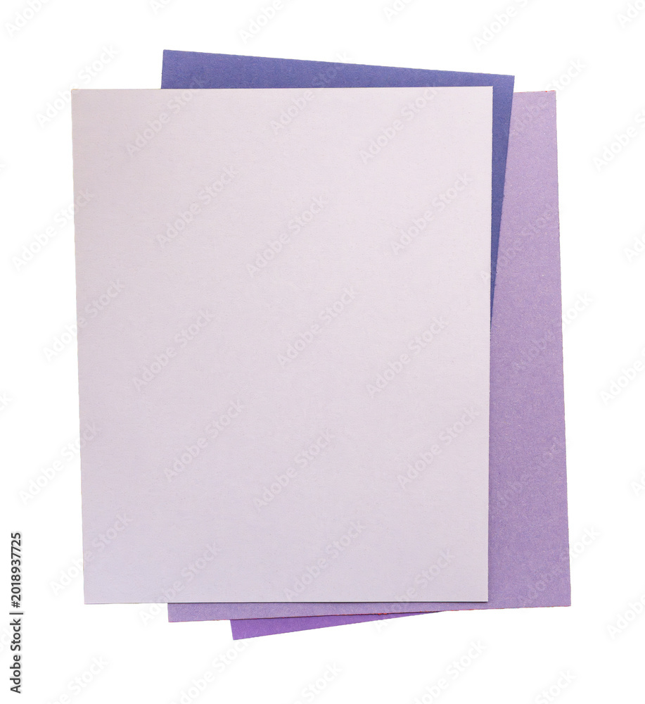 Fototapeta premium Stacked blank paper sheets in light and purple tones, arranged as a simple craft, stationery, and design material composition.