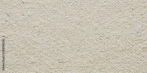 Foto Close-up beige fabric texture with subtle diagonal weave pattern