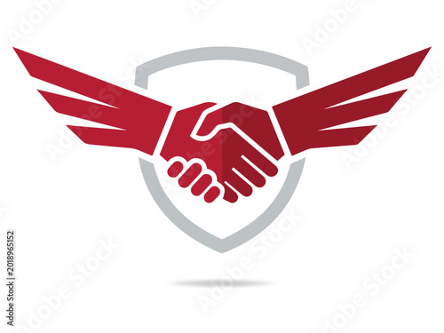 Winged handshake on shield logo business success agreement partnership concept.