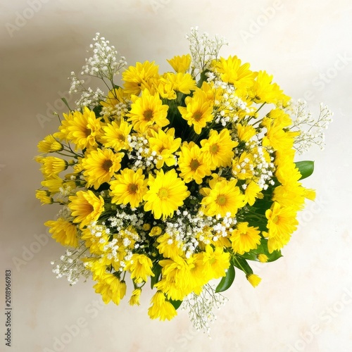 Bright Yellow Flowers Arranged in a Bouquet With White Accents on a Light Sur...